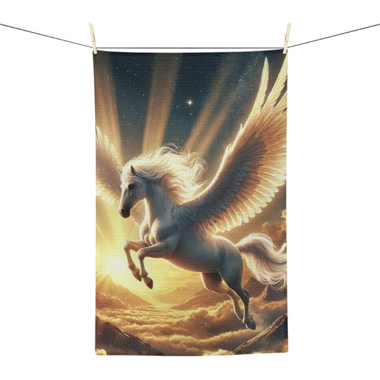 Mythical Pegasus tea towel with winged horse soaring over glowing clouds and mountains