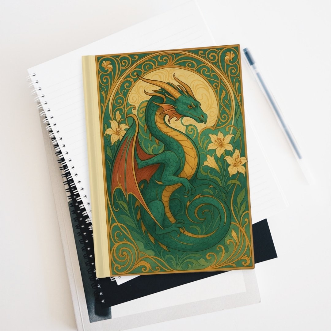 Notebook featuring ornate Art Nouveau dragon illustration.