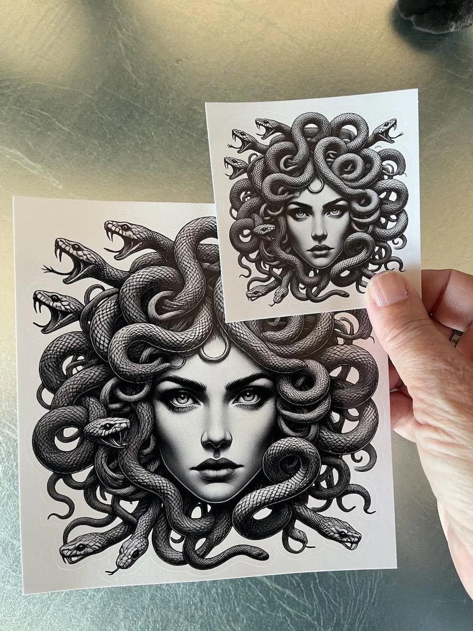 Black and white Medusa art stickers with snake hair, mythological fantasy design