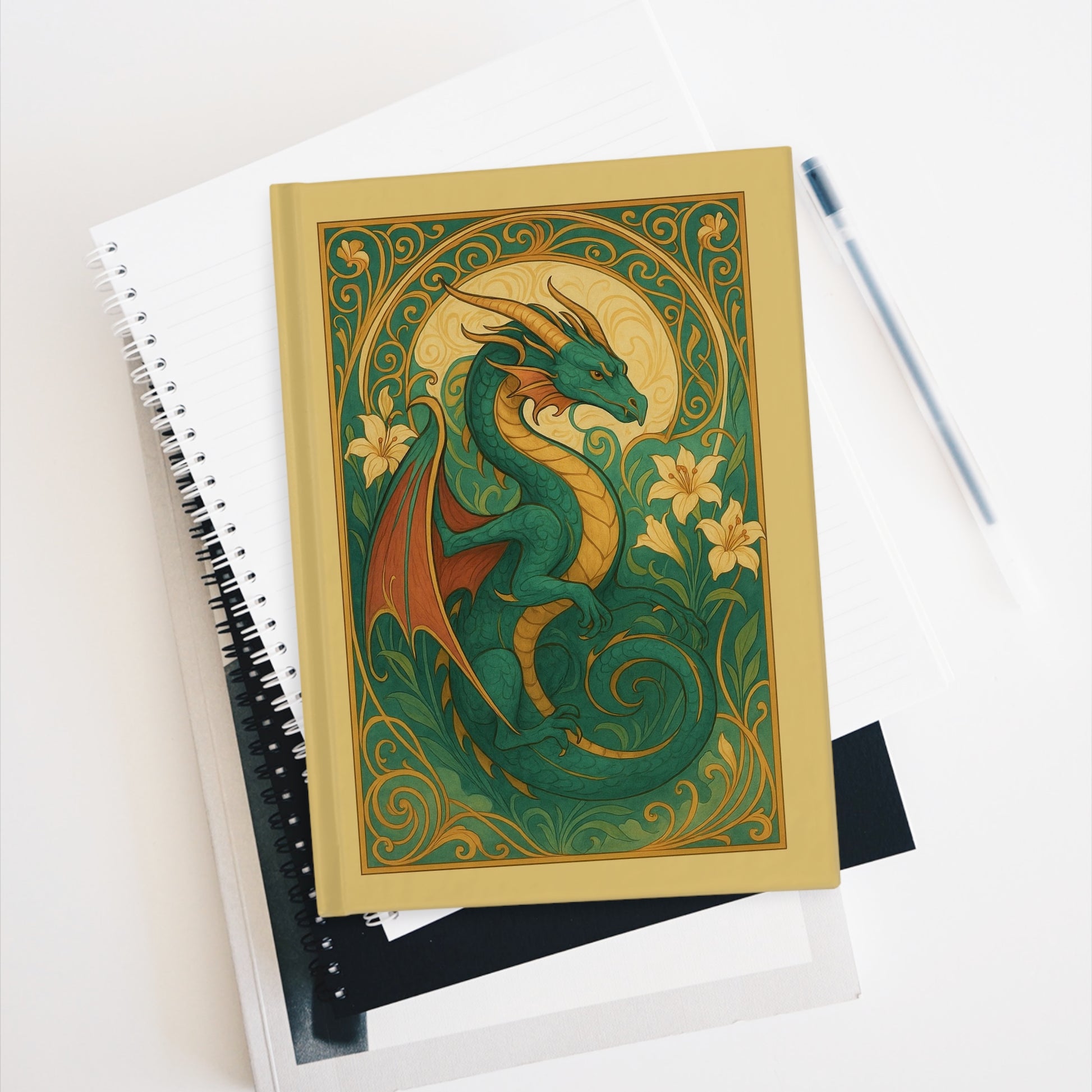 Art Nouveau dragon journal with green and gold fantasy design, floral details on notebook cover