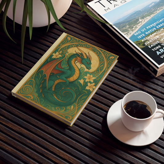 Notebook featuring ornate Art Nouveau dragon illustration.