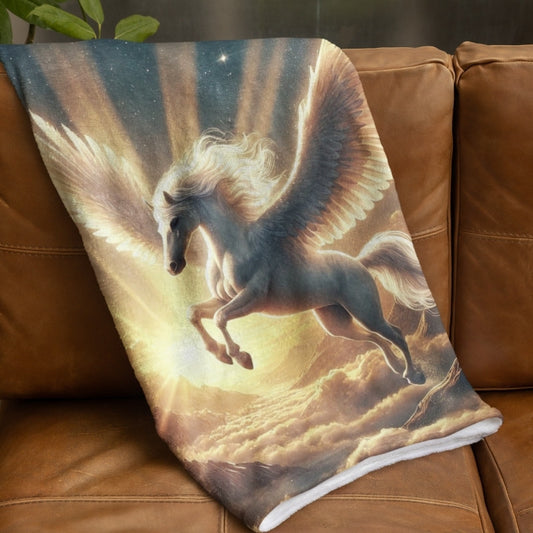 Velveteen blanket featuring a majestic pegasus flying above clouds with radiant sunlight