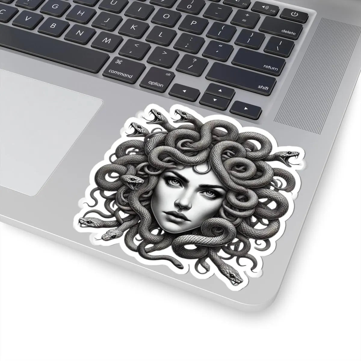 Medusa mythology art sticker on laptop, fantasy head with snake hair, black and white design