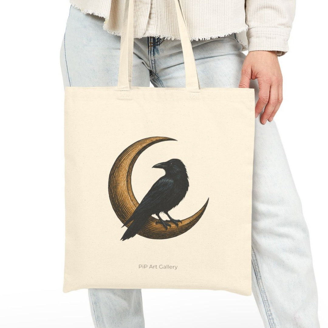 Tote bag with raven on a golden crescent moon, mythology fantasy inspired art